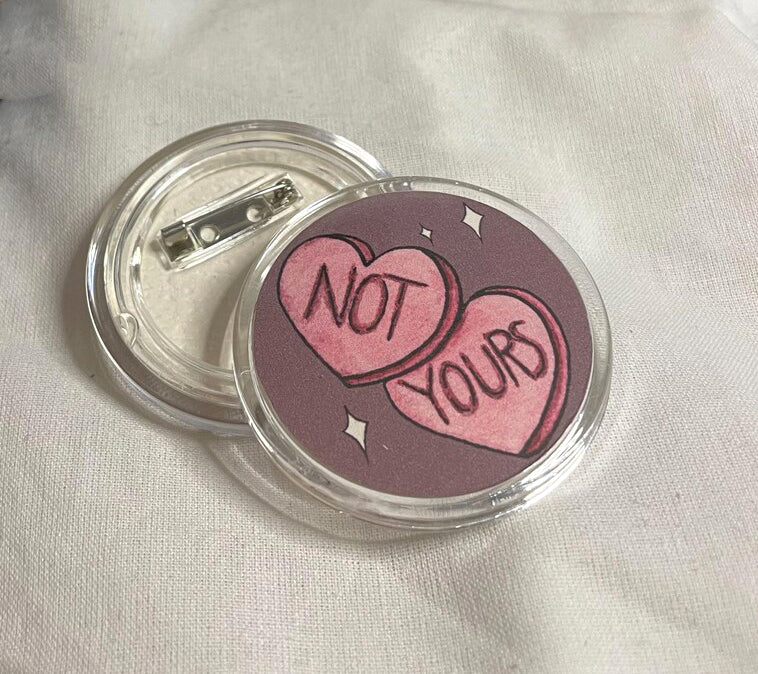Not Yours pin badge