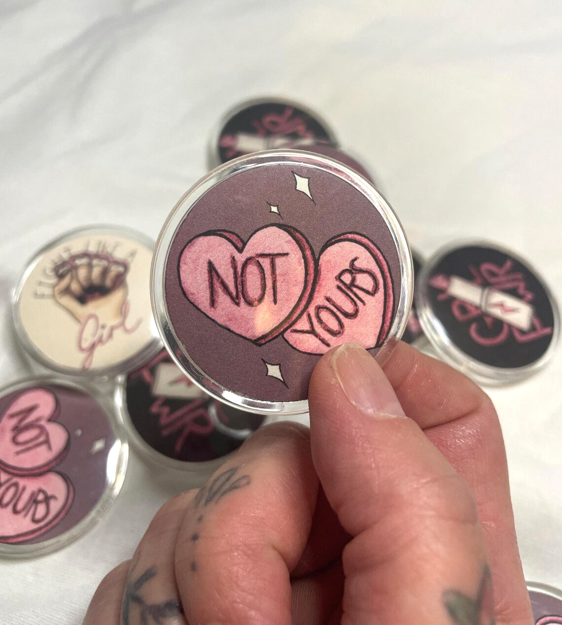Not Yours pin badge