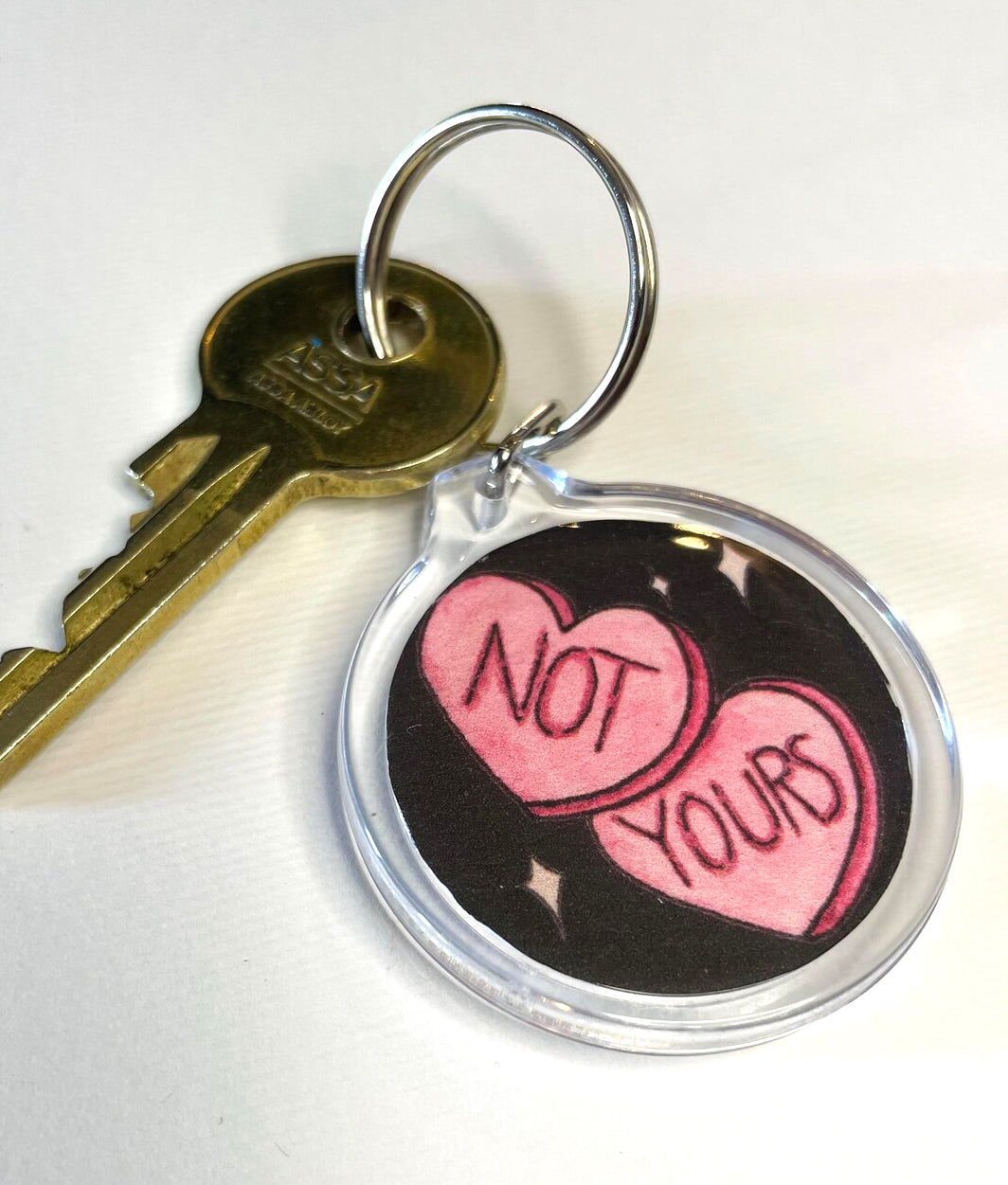 Not Yours keyring