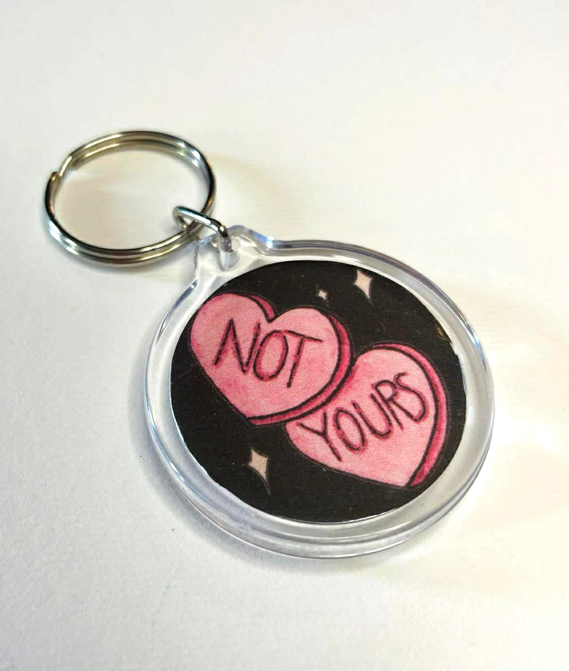 Not Yours keyring